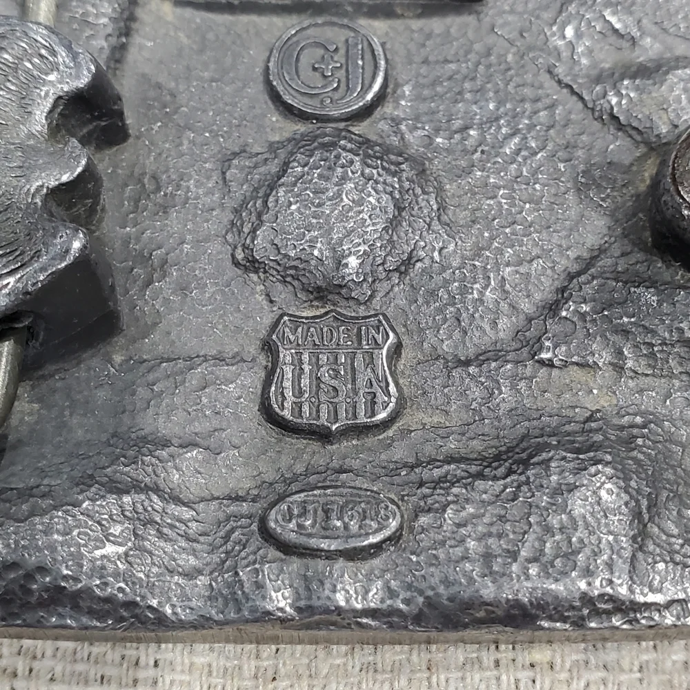 VINTAGE CARPENTER BELT BUCKLE SILVER METAL C&J INC 1994